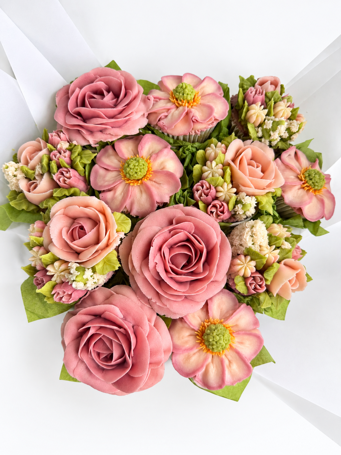 12 Cupcake Bouqcake in dusky pinks, with classic vanilla sponge.